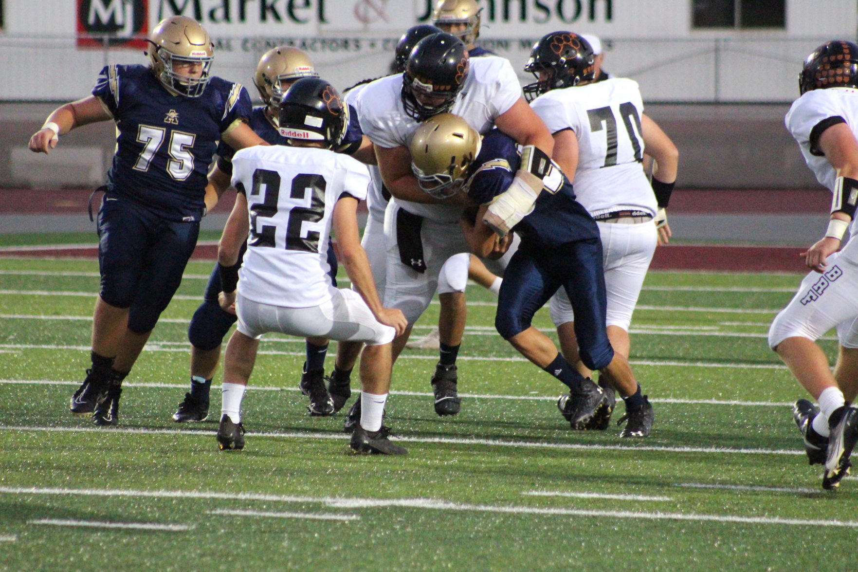 Robert Cogswell makes a tackle